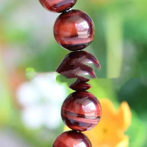 Red tigereye lightning cat's eye wood alexandrite bracelet with geometric ethnic styling
