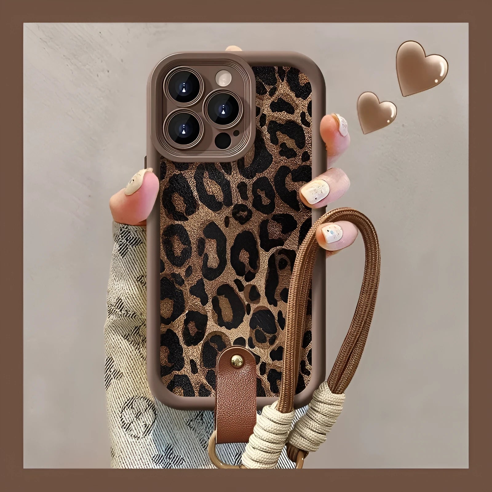 Brown leopard print silicone iPhone case showing the integrated lanyard loop on the corner.