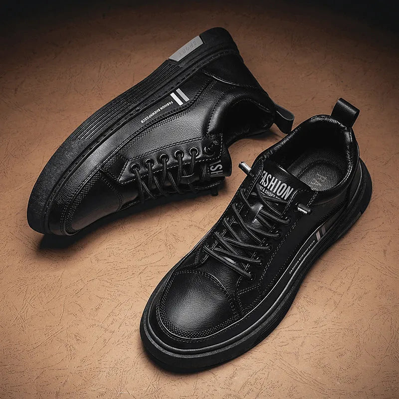 Men's white and black low-top skate shoes with elastic band and round toe.