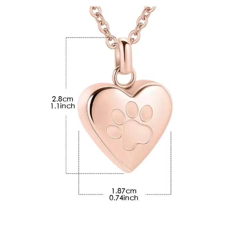 Titanium steel heart pendant necklace with paw print engraving, shown in silver finish.