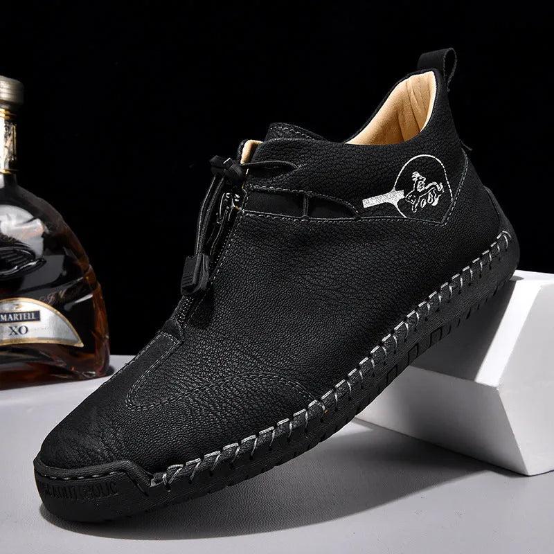 Men's black casual leather shoes with a round toe, tall crown, and a rubber sole.