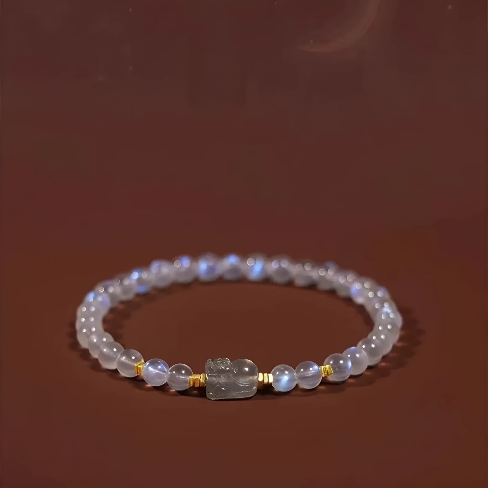 Women's moonstone bracelet with Zodiac animal modelling and blue light stones