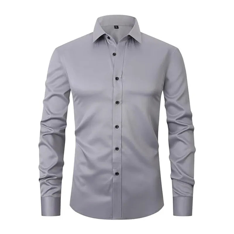 Man wearing a grey stretch long sleeve polyester work shirt, showing fit and collar detail.