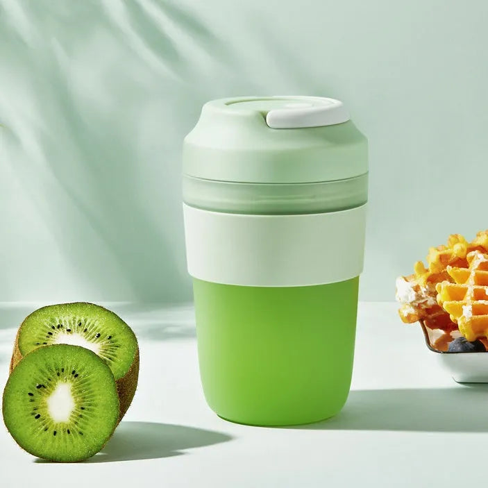 Portable USB rechargeable blender cup in purple, green or orange with 400ml capacity and four stainless steel blades