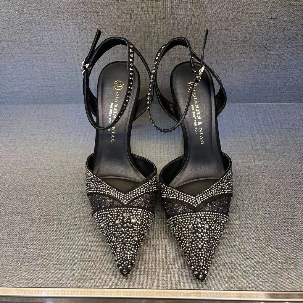 Women's black pointed-toe stiletto high heels with a hollow heel and red sole
