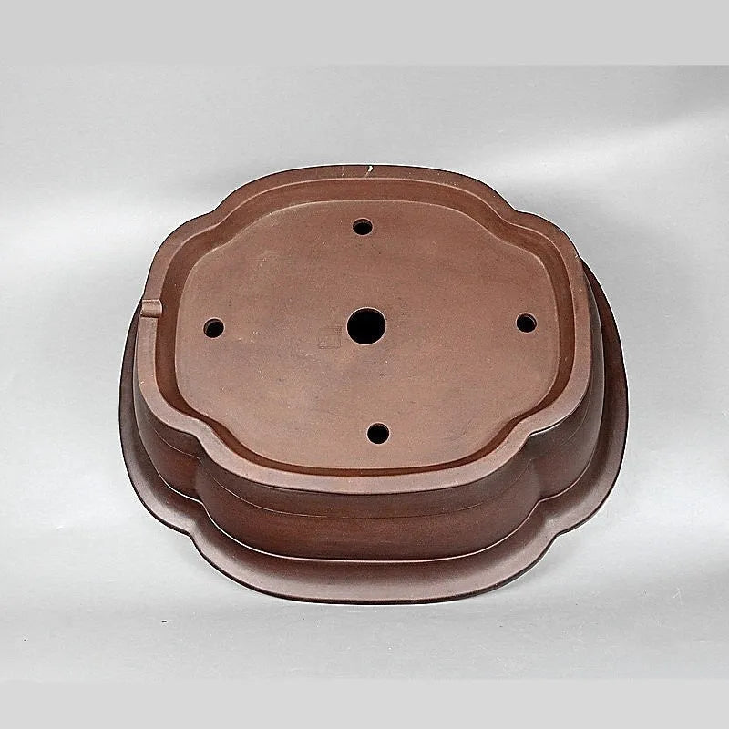 Handmade Chinese crabapple-shaped purple clay flowerpot for plants.