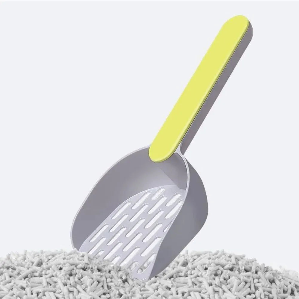 A blue plastic cat litter scoop with sifting holes on a white background.