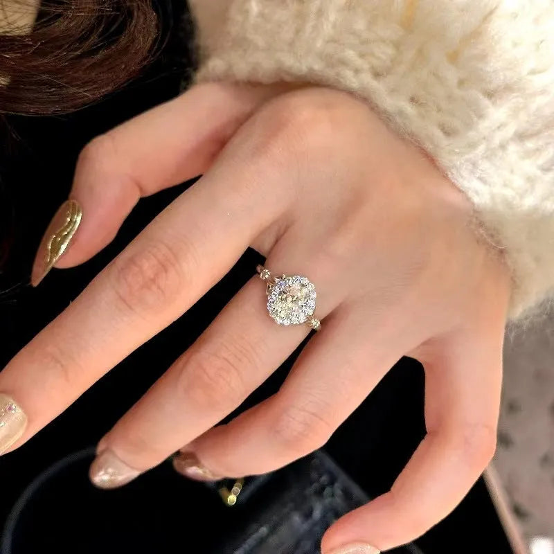 Silver adjustable ring with a large geometric bridal bouquet design and diamond treatment.