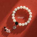 National style Bodhi bracelet with round beads and Ruyi element in black, gold, or red colours