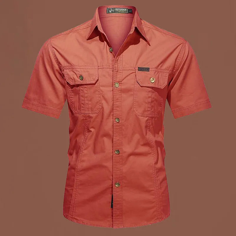 Men's short sleeve cotton shirt in army green colour, showing loose fit and cardigan style on a hanger.