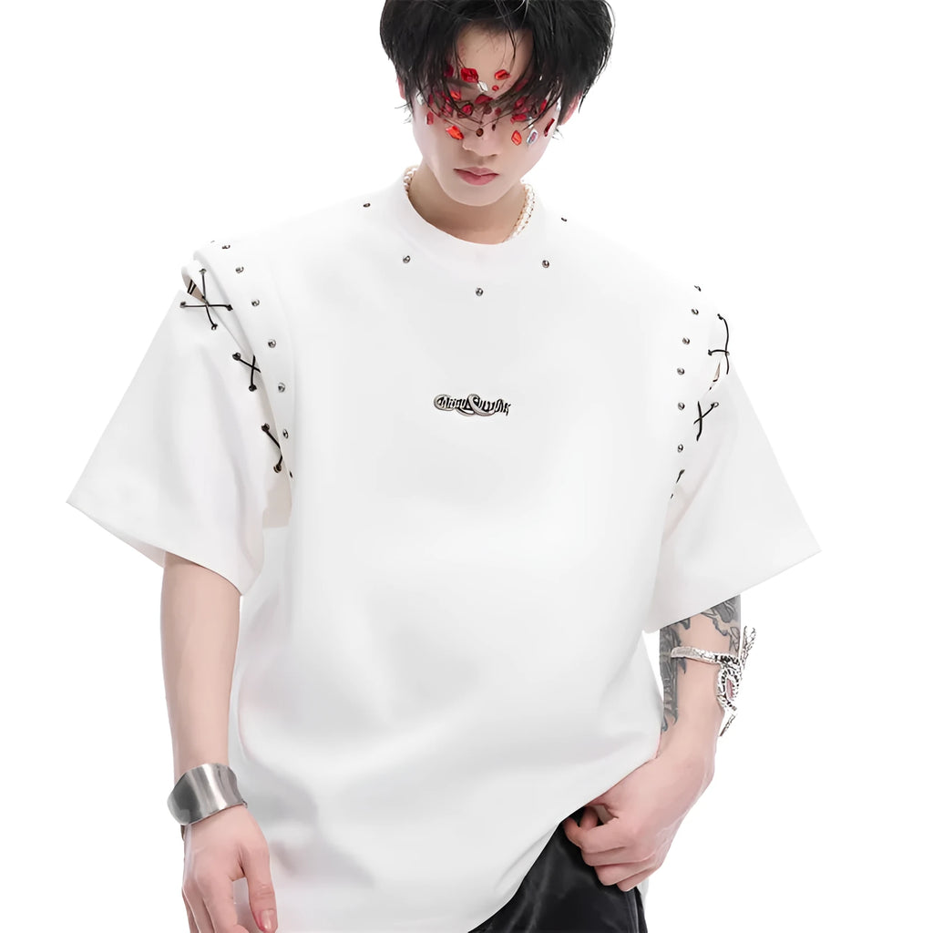 Deconstruction style short sleeve T-shirt with lace-up sides and cutout details in black or white.