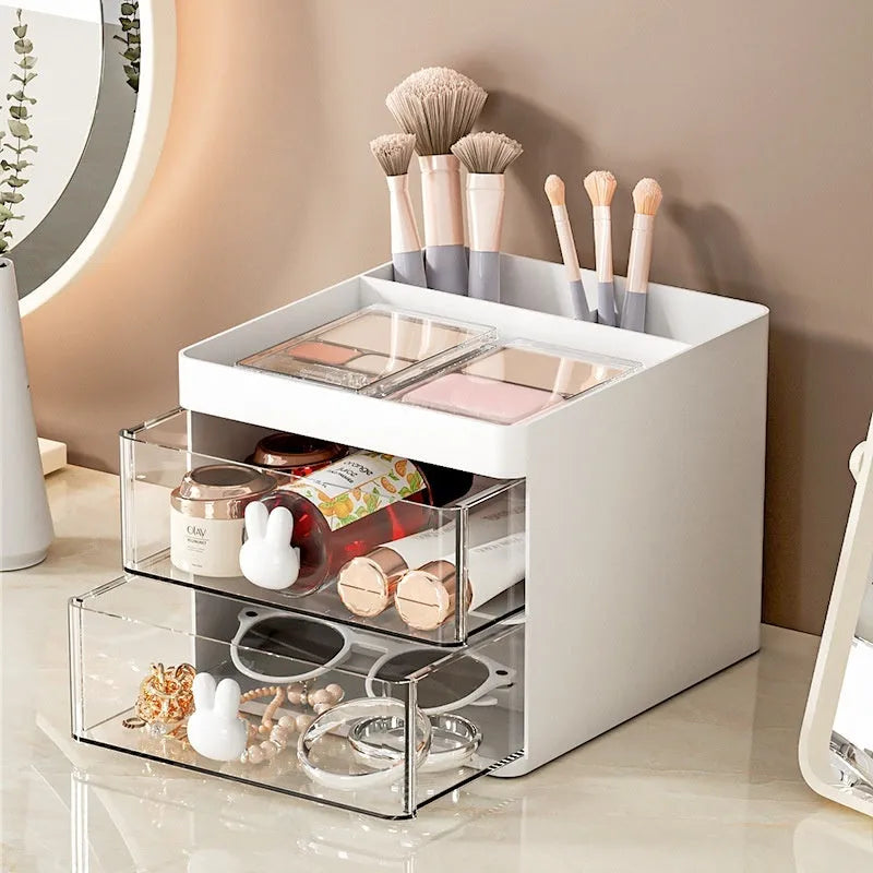 Transparent partitioned desktop storage box in cherry blossom pink with grid compartments and dustproof lid
