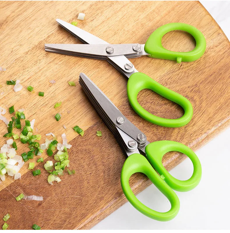 Stainless steel multi-layer onion scissors for cutting herbs and green onions.