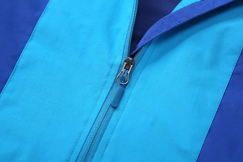 Blue slim-fit boys autumn jacket with full zip on a hanger