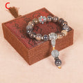 Men's ceramic gradient bead Buddhist charm bracelet with coloured glaze, approximately 13mm diameter.