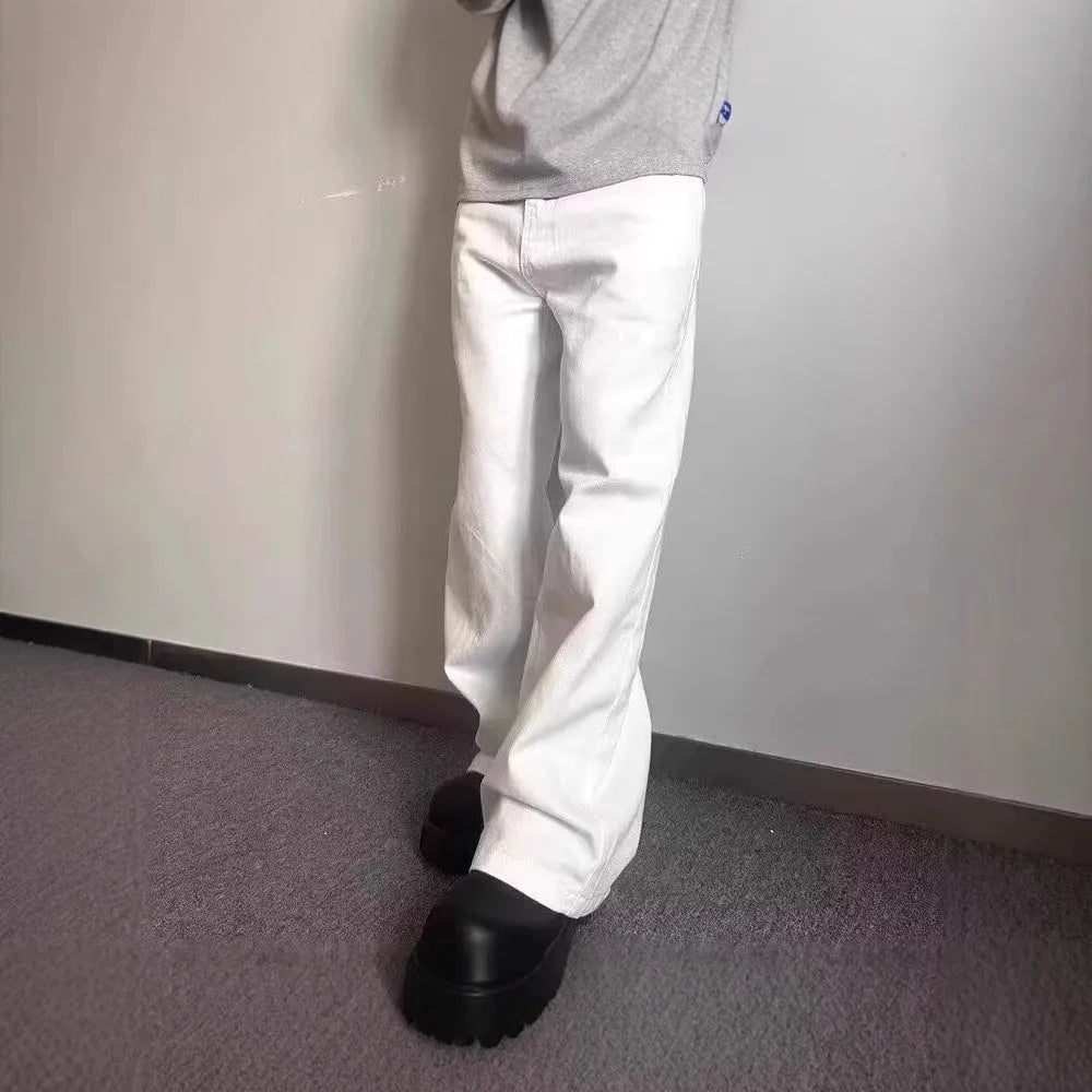 Men's white straight-leg cotton denim jeans on a neutral background.