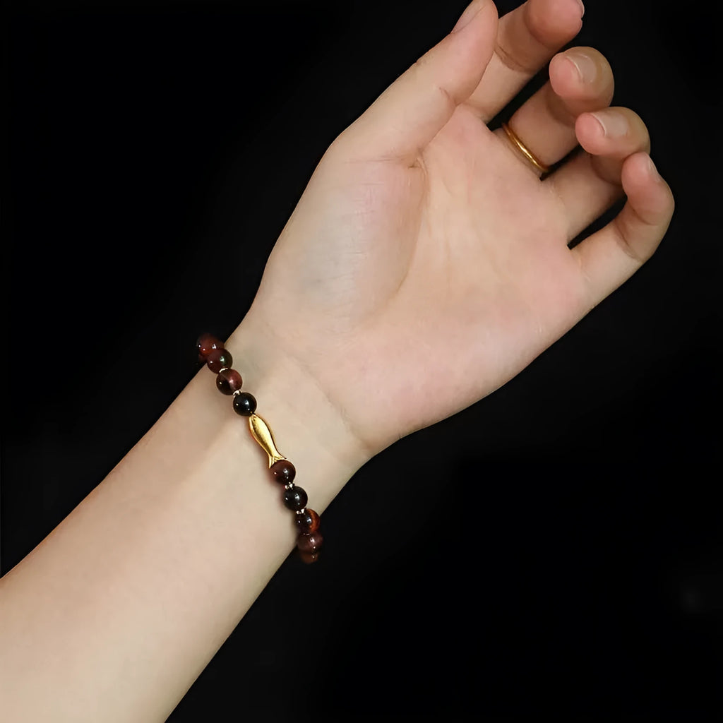Handmade yellow tiger eye bracelet with small fish charm bead for women