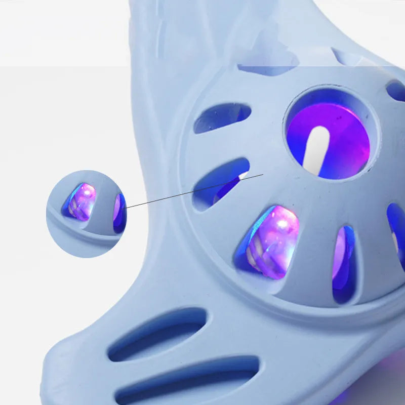 Blue bite-resistant boomerang dog toy with molar texture for large breed chewing.