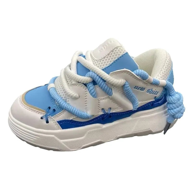 Women's grey retro chunky sneakers with thick rubber platform sole and lace-up front.