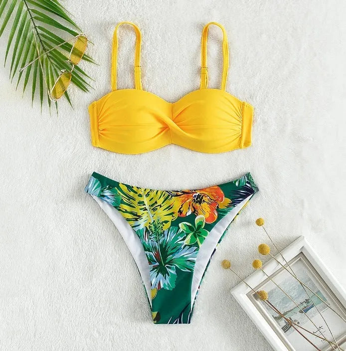 Two-piece bikini swimsuit with hard push up cups in briefs style, shown in available colours.