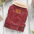 Red fleece-lined PU leather coat for a small dog, showing the two-legged design and British style.