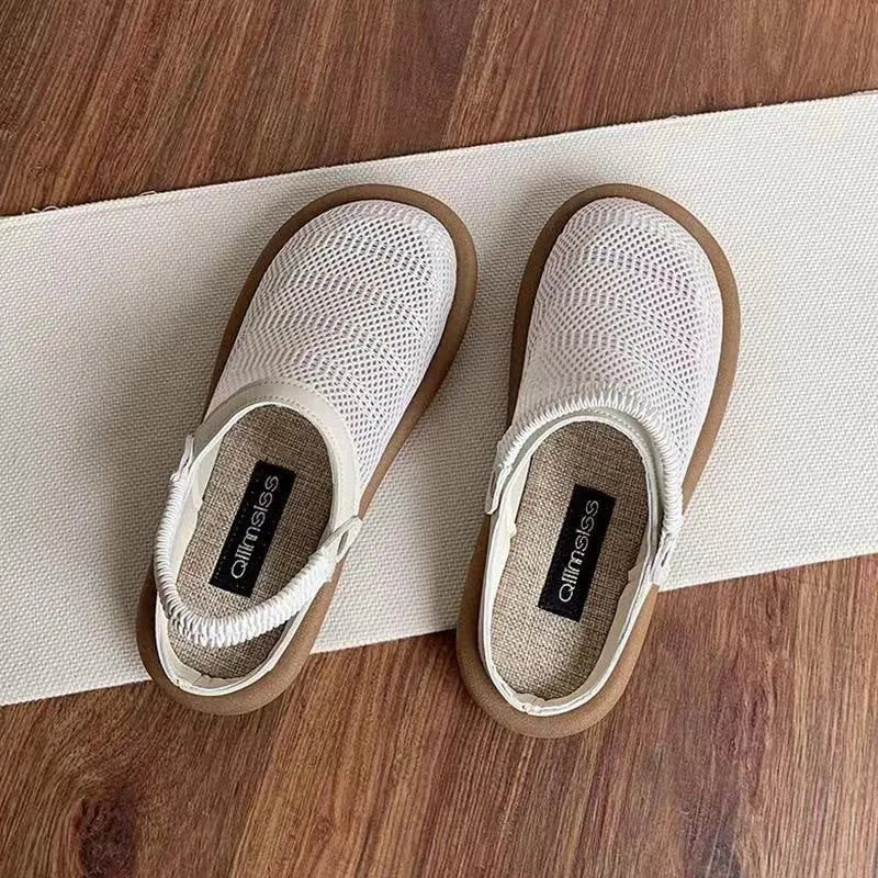Linen slip-on hole shoes with mesh lining and rubber sole in milky white colour