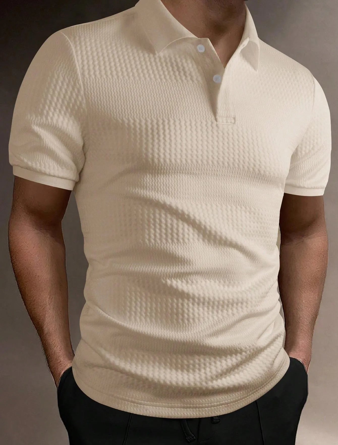 Man wearing a striped loose-fit polo shirt in a light blue colour, suitable for business casual summer wear.