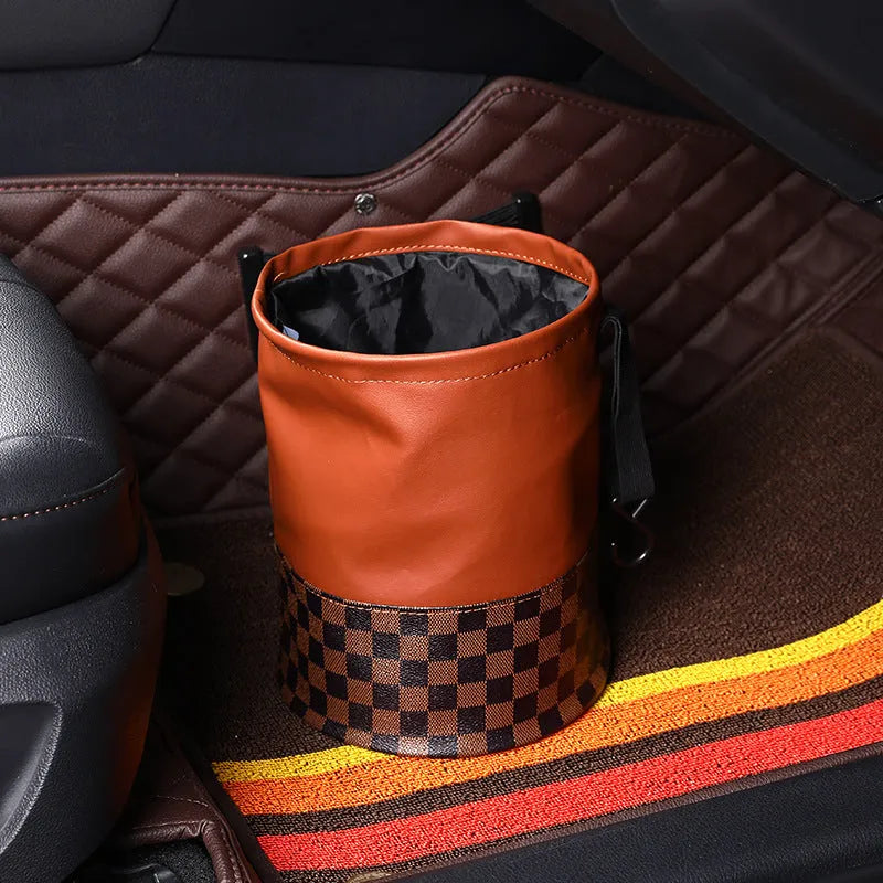 Retractable leather interior car trash can with handle, shown in colour as pictured.
