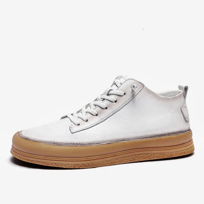 A pair of black men's round-toe casual leather shoes with white laces on a flat rubber sole.