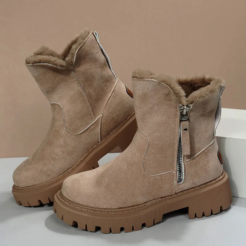 Women's black thick plush snow boot with side zipper and round toe on a rubber sole.
