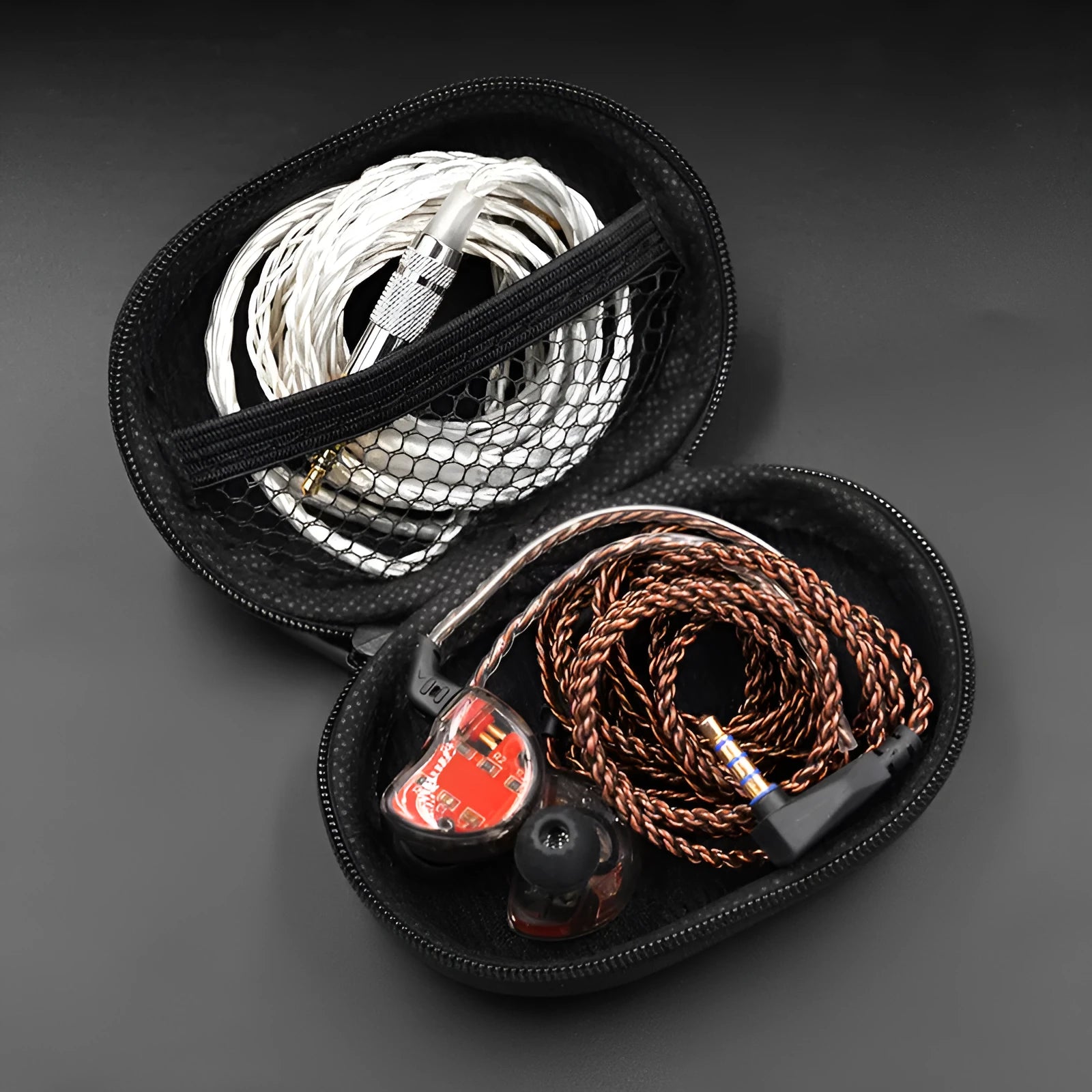 Black leather oval-shaped earphone storage bag for EDX PRO and compatible models.
