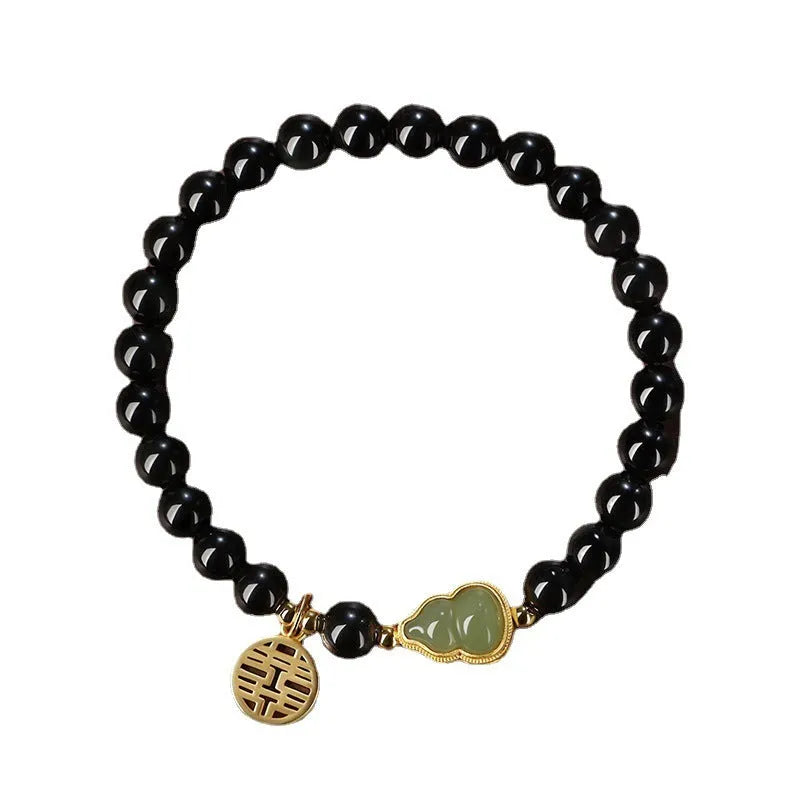 Natural black obsidian bracelet with Hetian jade gourd pendant in geometric bead design