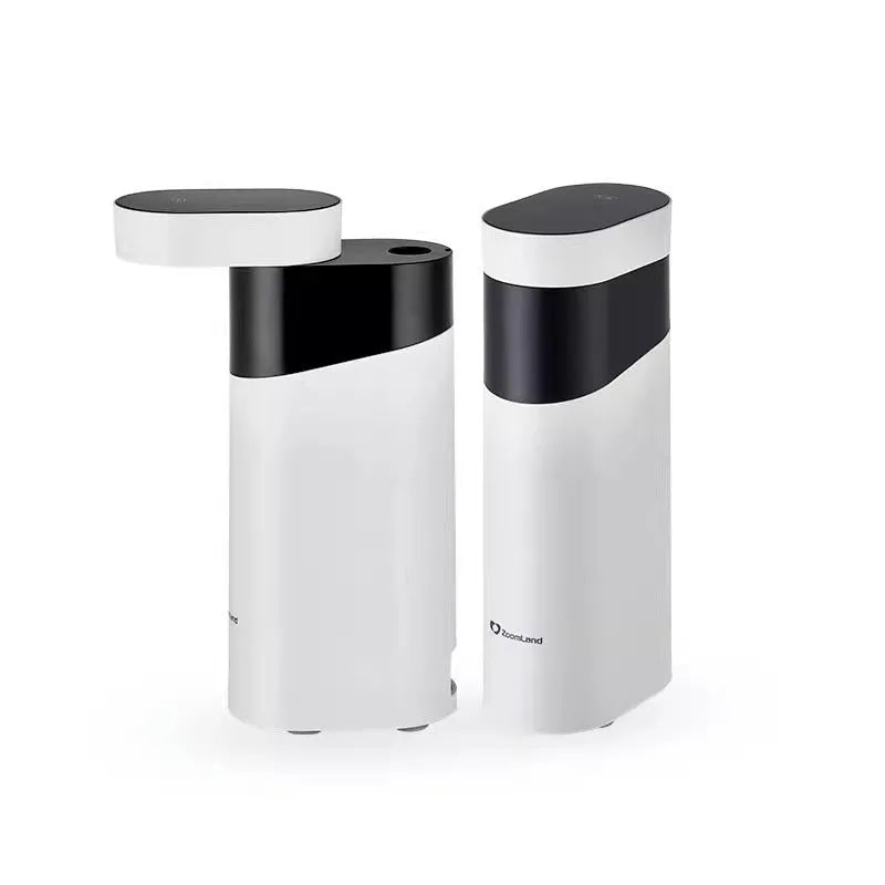 Compact black or green desktop instant water dispenser with digital display on a wooden table.