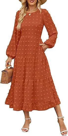Women's long sleeve high waist dress with ruffled sleeves in a solid colour.
