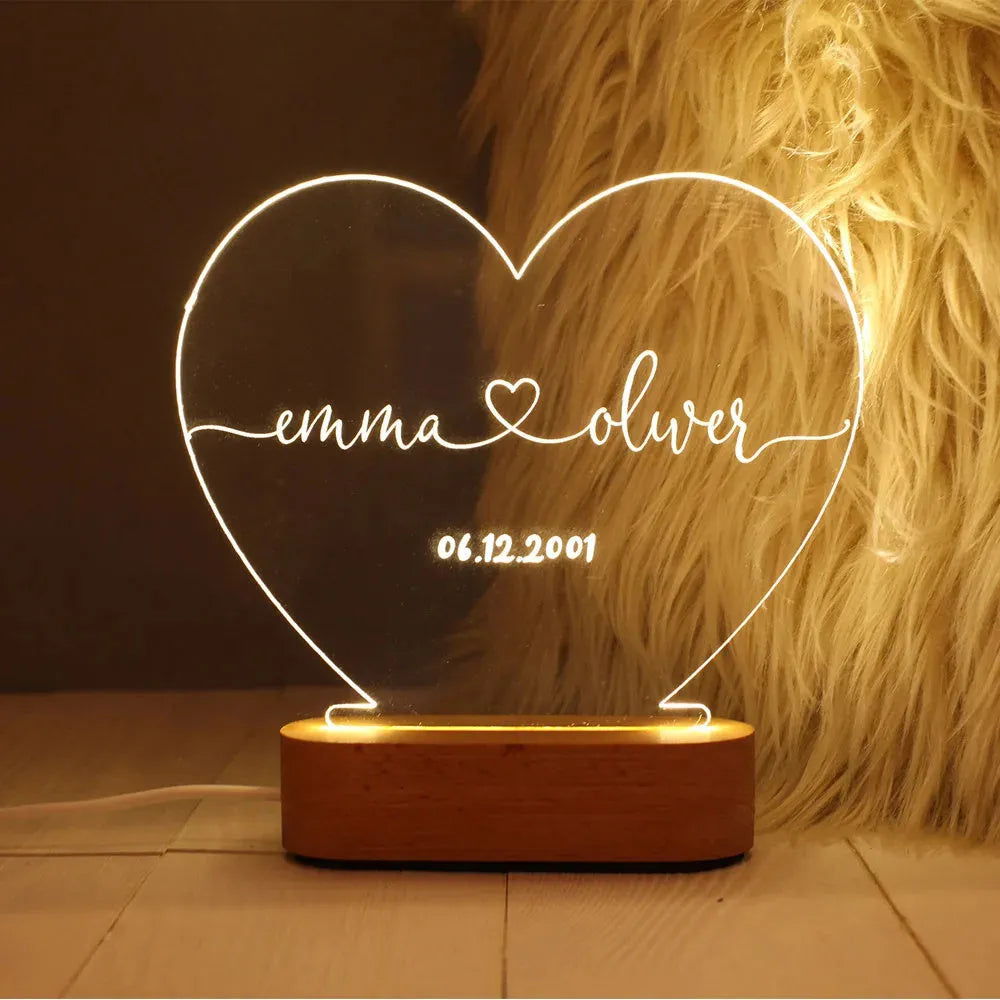 Custom transparent acrylic night light with LED base showing personalised text