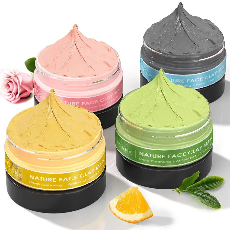 Set of four clay face mask jars: Dead Sea Mud, Green Tea, Turmeric, and Rose, each 80ml.