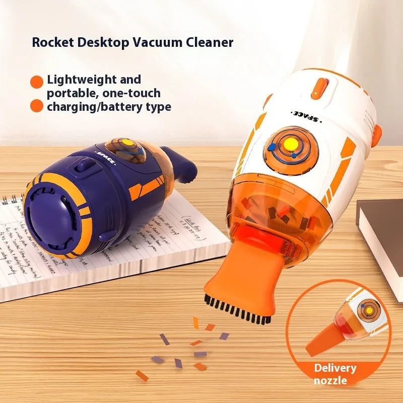 Handheld desktop vacuum cleaner in blue with USB charging cable