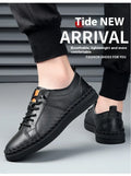 Men's beige and black cowhide leather sneakers with round toe and mesh lining.