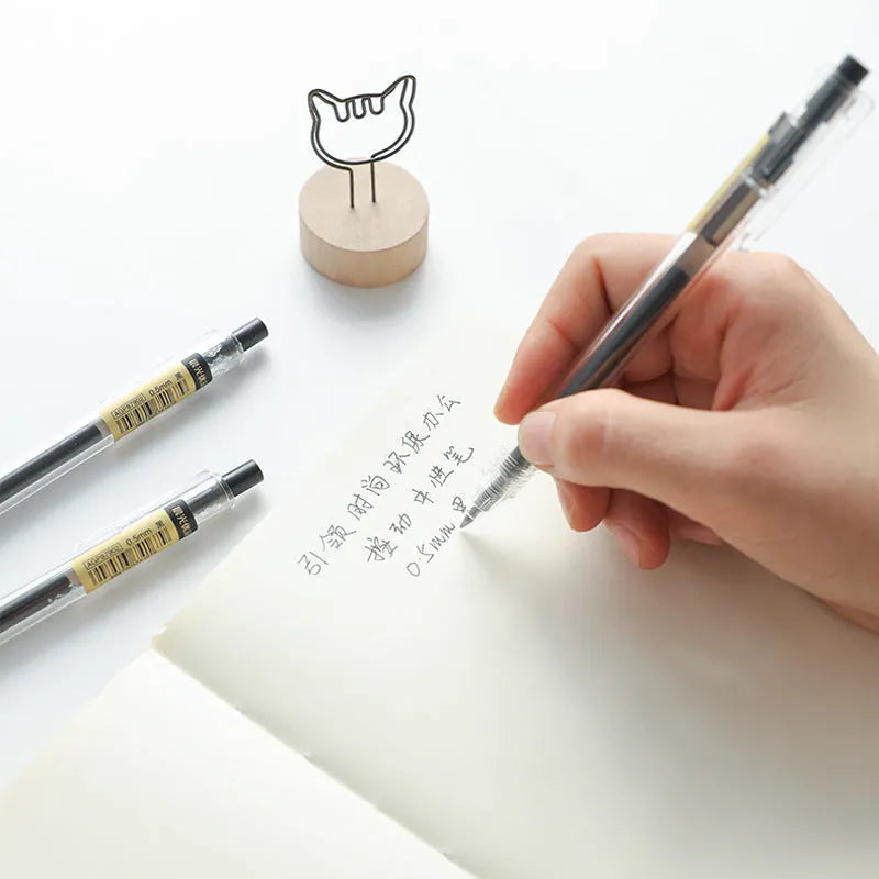 Set of 12 matte black retractable gel pens with 0.5mm tips and 2 refills