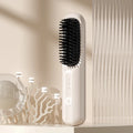 Beige wireless anion hair straightening comb with ceramic plates and Type-C charging port