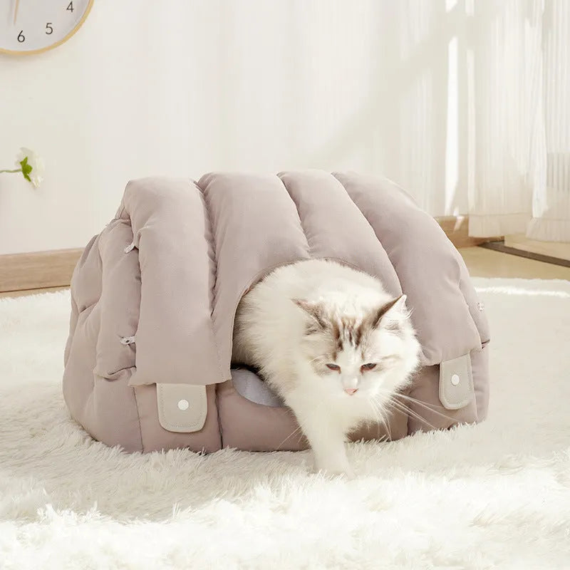 Grey arched fully enclosed cat nest bed with soft sofa exterior, shown next to a green one.