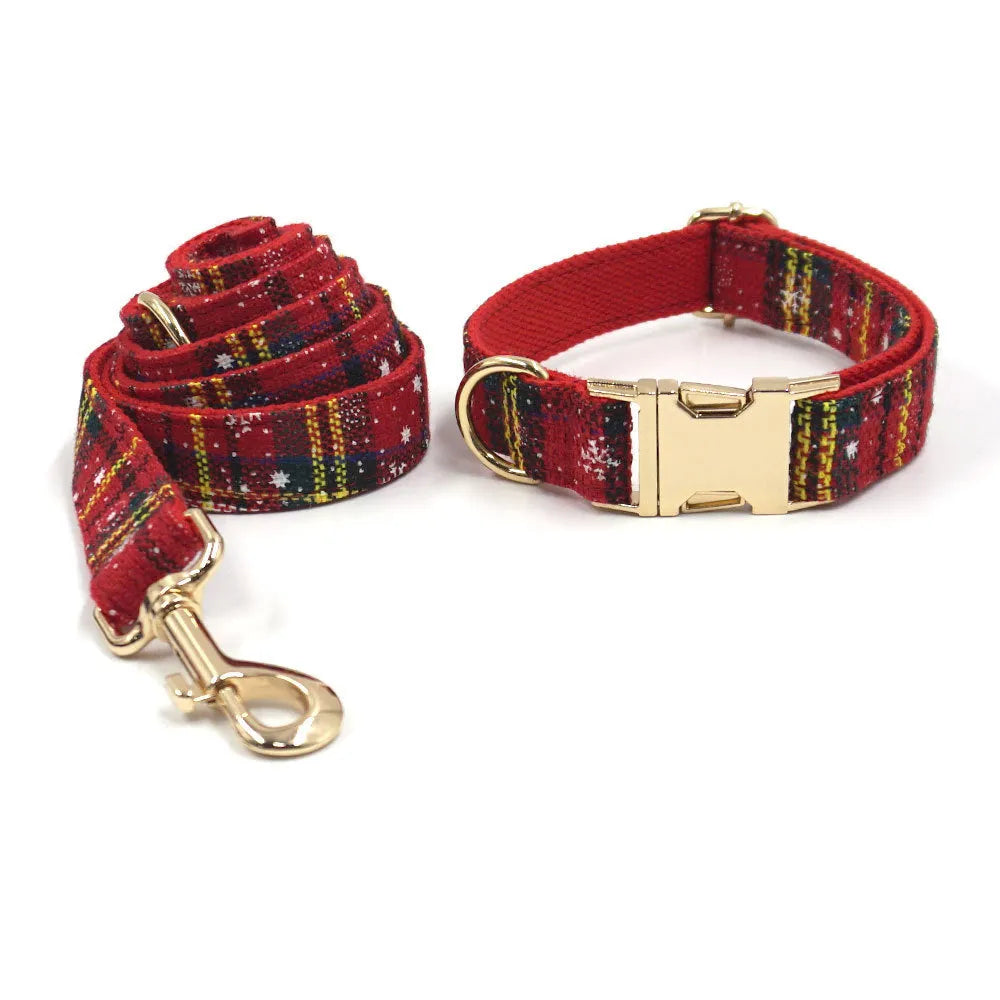 Red Christmas pet accessory set with collar, leash, bow, harness, and waste bag with laser cut decoration