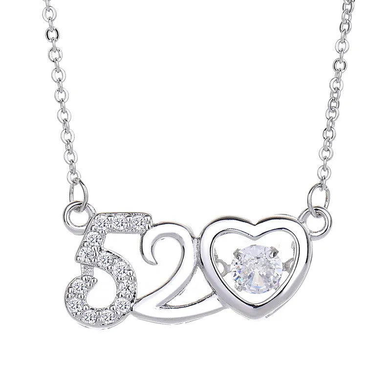 Silver love heart pendant necklace with crown and bow detail for women