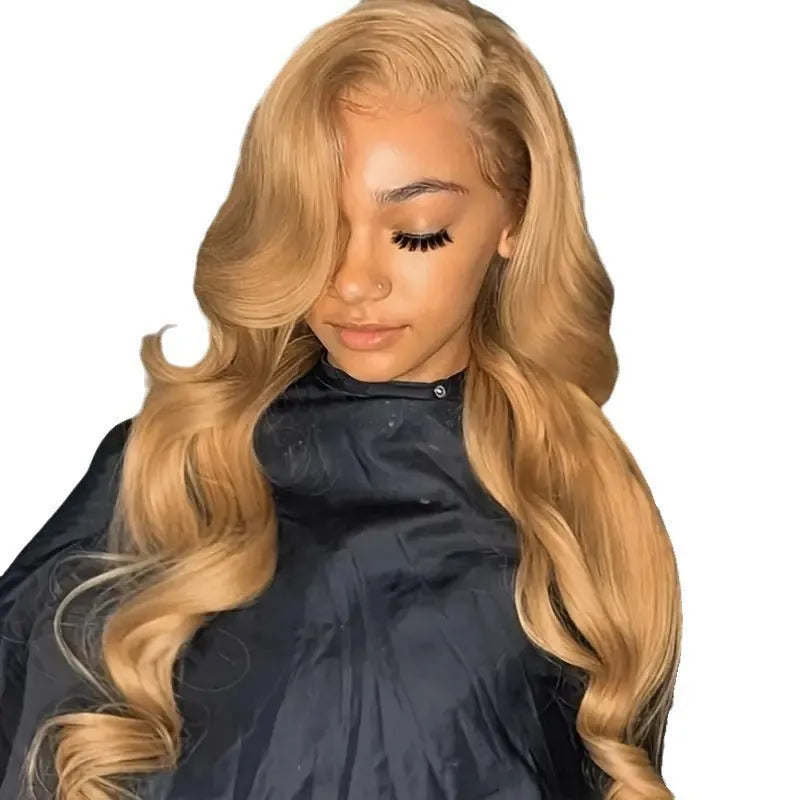 Light brown synthetic wig with big wave curls and side bangs in a long length.