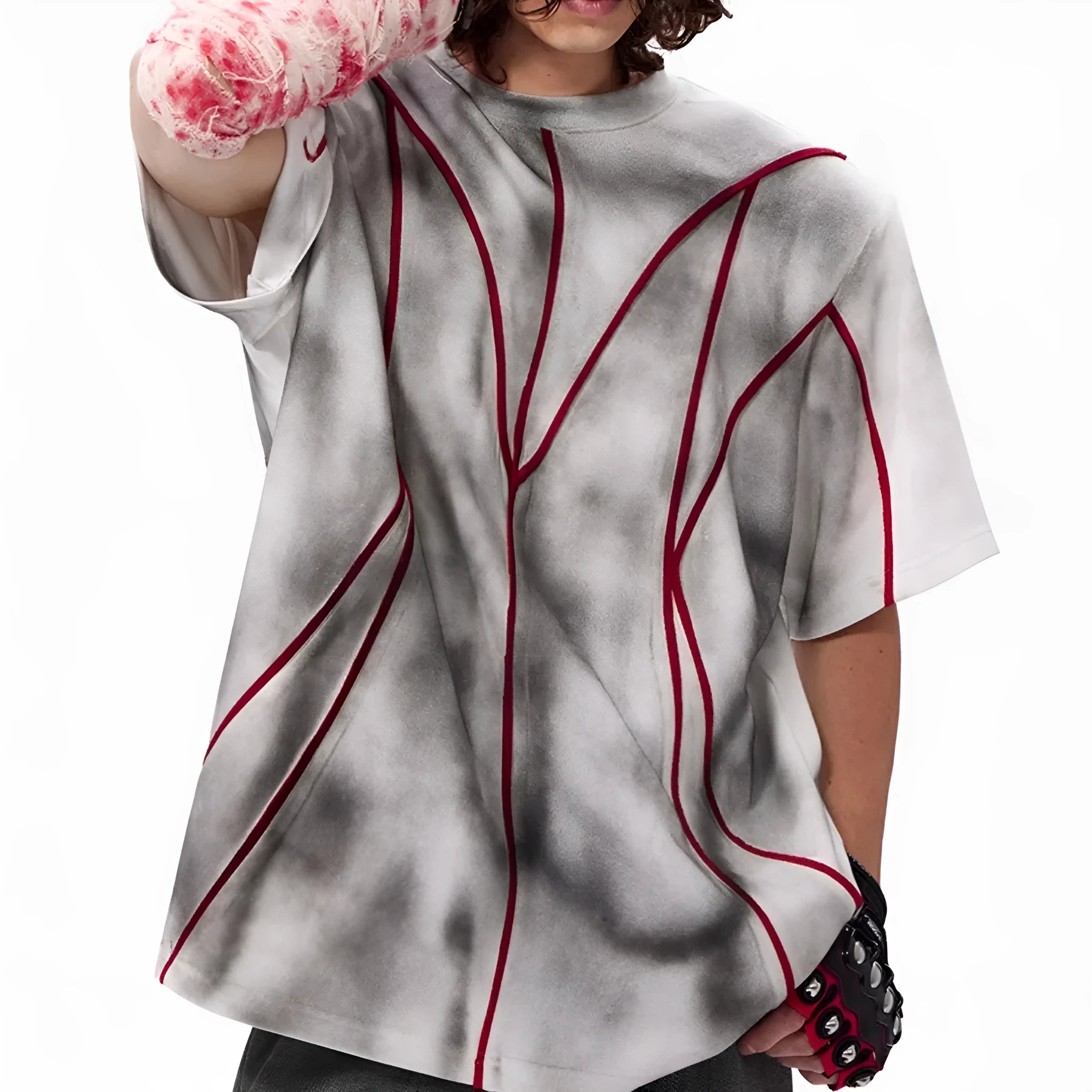 Short sleeve T-shirt with padded shoulders and three-dimensional line patchwork detail on a round neck