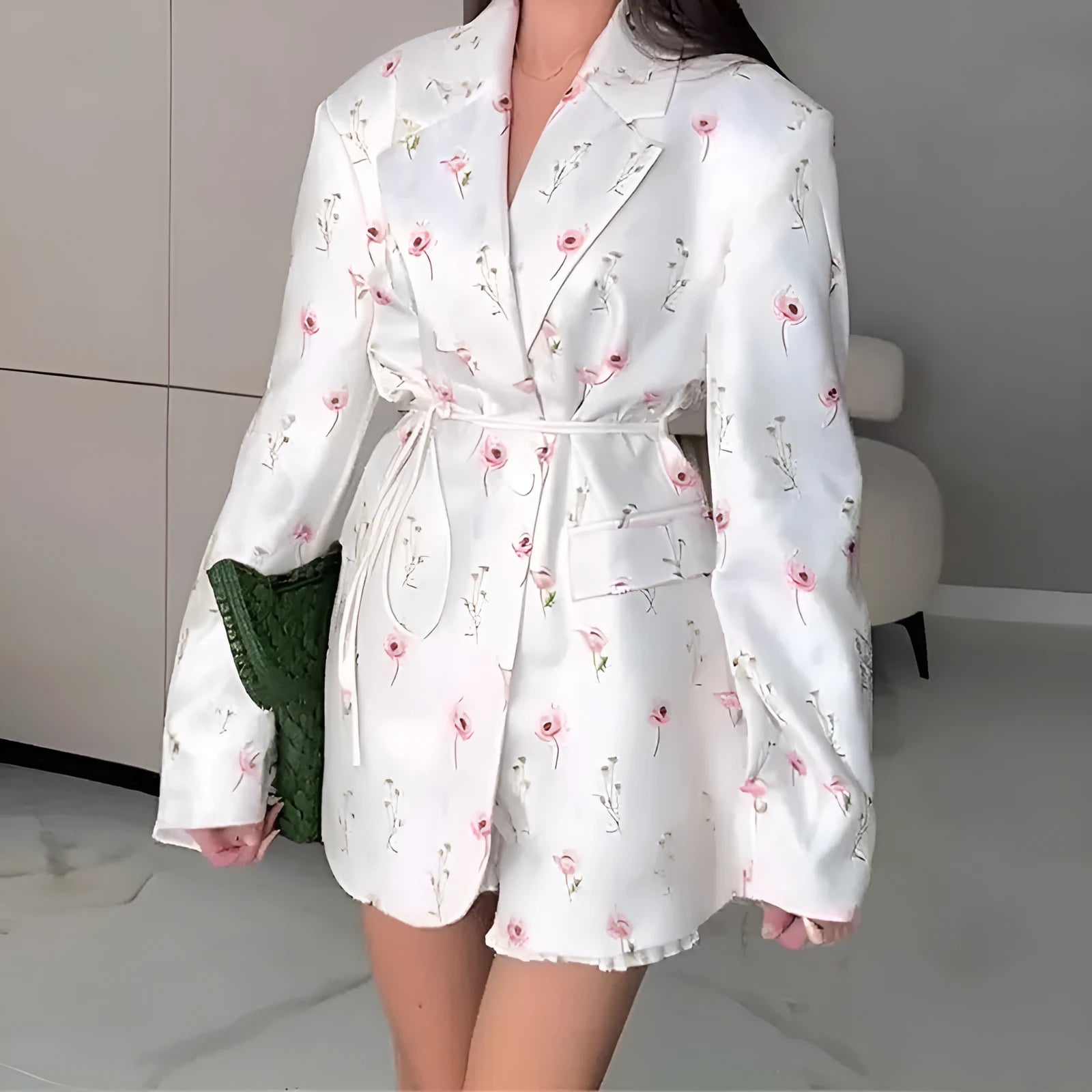 Men's collar suit jacket with a lace-up detail at the waist, shown in a floral print colour.