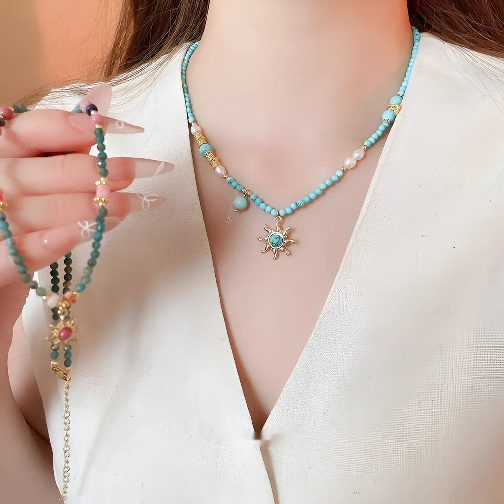 French court style freshwater pearl necklace with sun pendant on adjustable clavicle chain