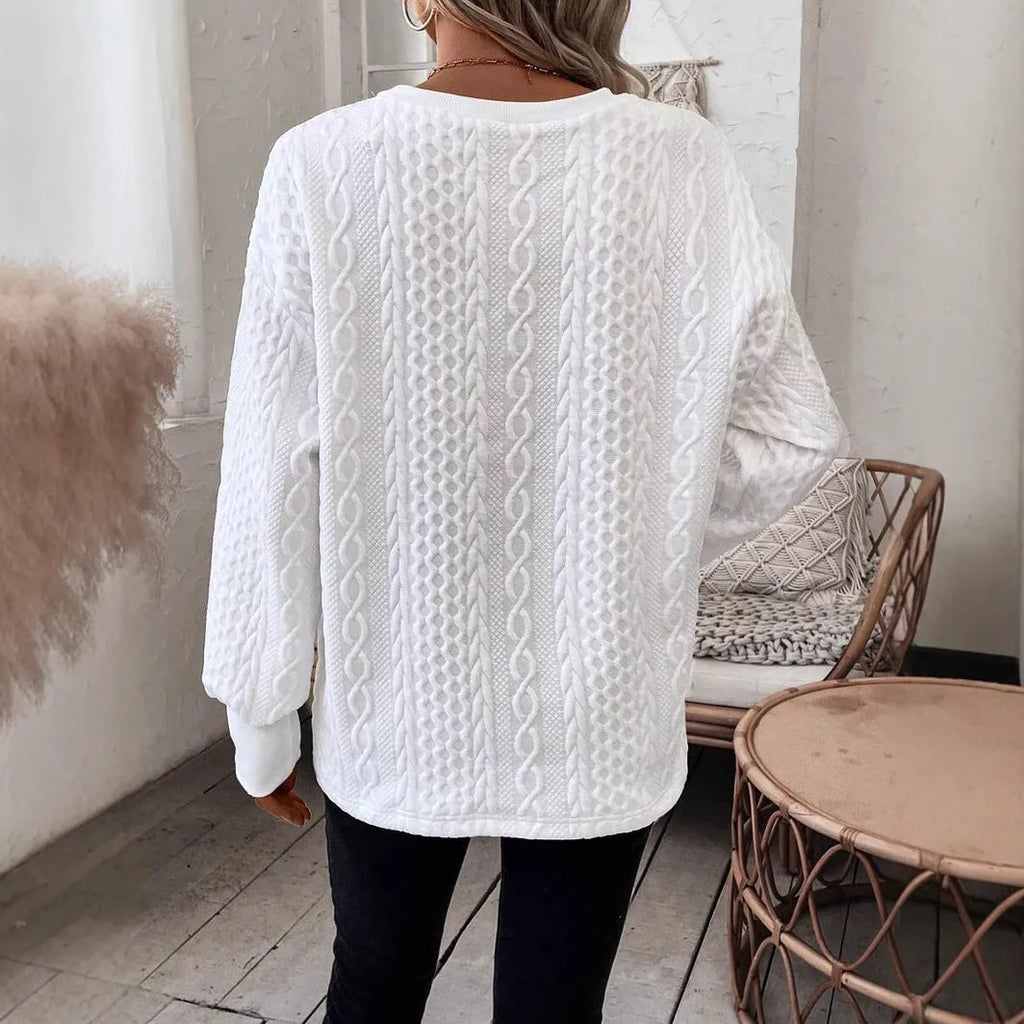 Milky white loose fit long sleeve T-shirt with a 3D pattern, casual pullover style.