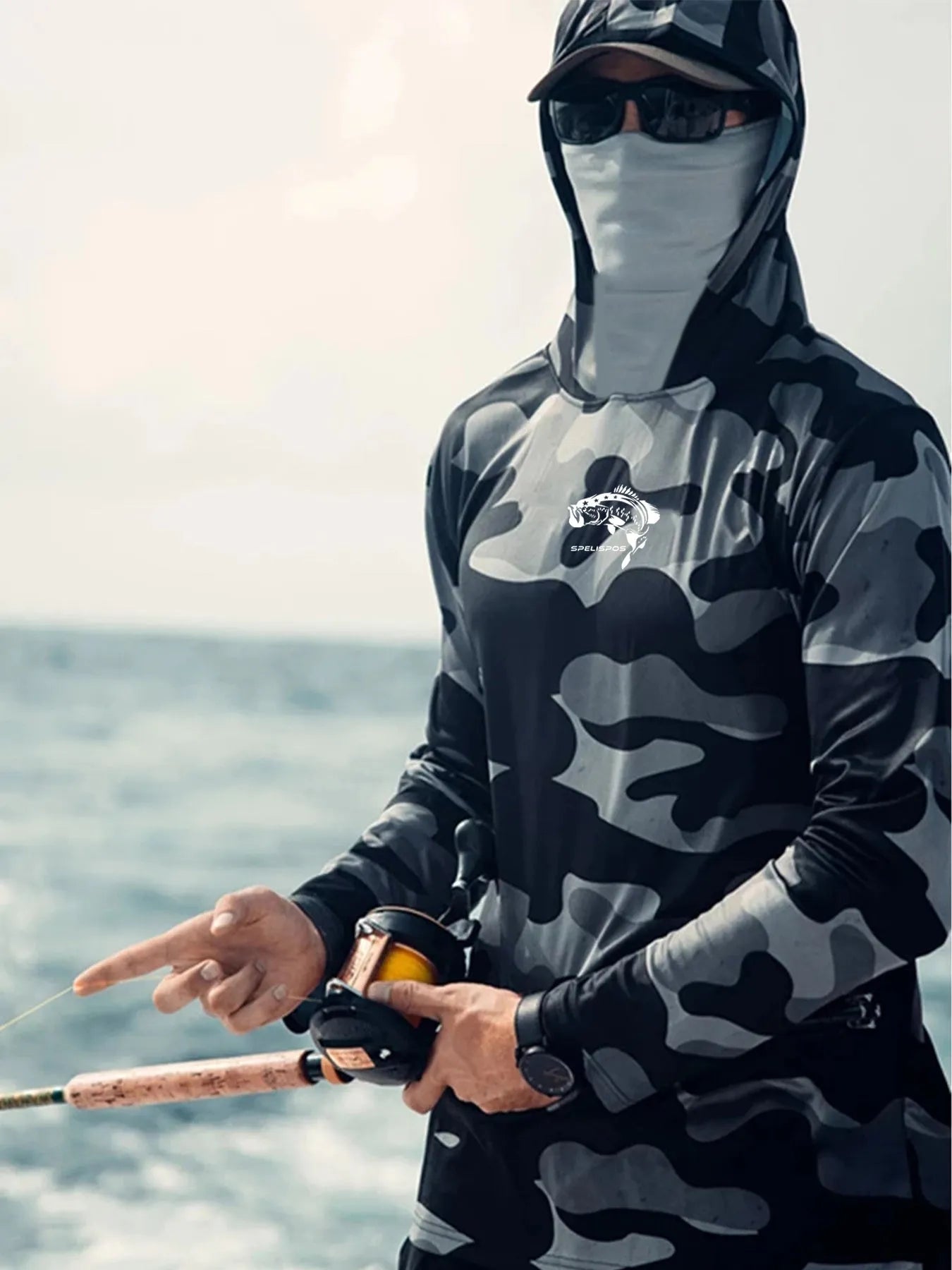 Huk Pursuit long sleeve performance fishing shirt with mesh side panels shown on a model.