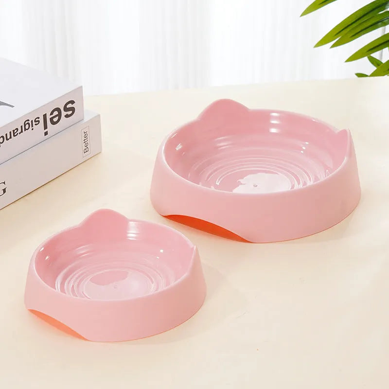 Ceramic dog slow feeder bowl with puzzle cups in blue, shown in large and small sizes.